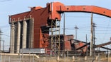 A steel mill is seen in Middletown, Ohio, on October 24, 2022. - In the face of the rising prices that are crushing this election campaign, Joe Biden is hammering home his message: the tens of billions of dollars voted on by the Democrats will revive American manufacturing and its "good-paying jobs." He is trying to reconnect with the white working class, which has been largely lost to a Democratic Party that has long supported free trade. But in Ohio, where Donald Trump came out on top in the last two presidential elections, inflation and a deep sense of disenfranchisement are hampering this strategy. (Photo by Megan JELINGER / AFP) (Photo by MEGAN JELINGER/AFP via Getty Images)