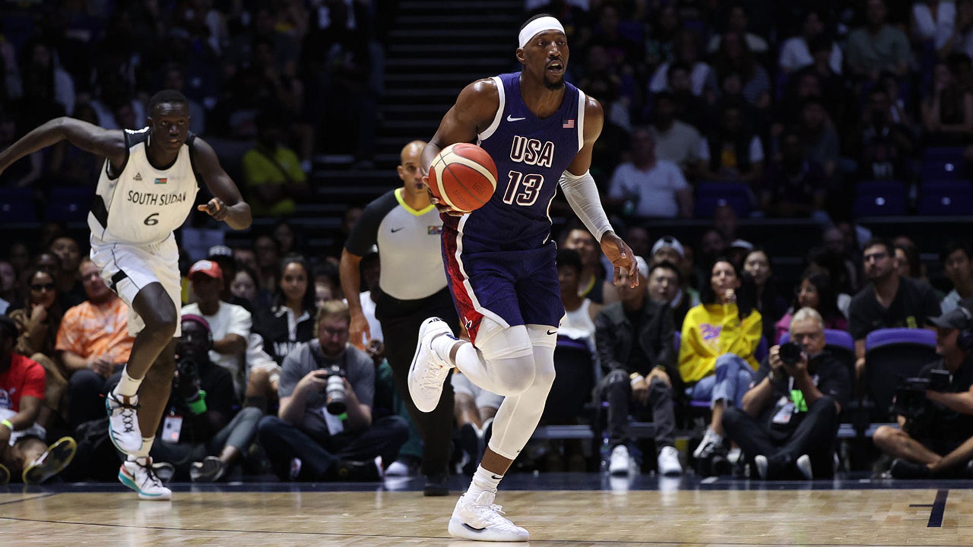 Bam Adebayo dribbles