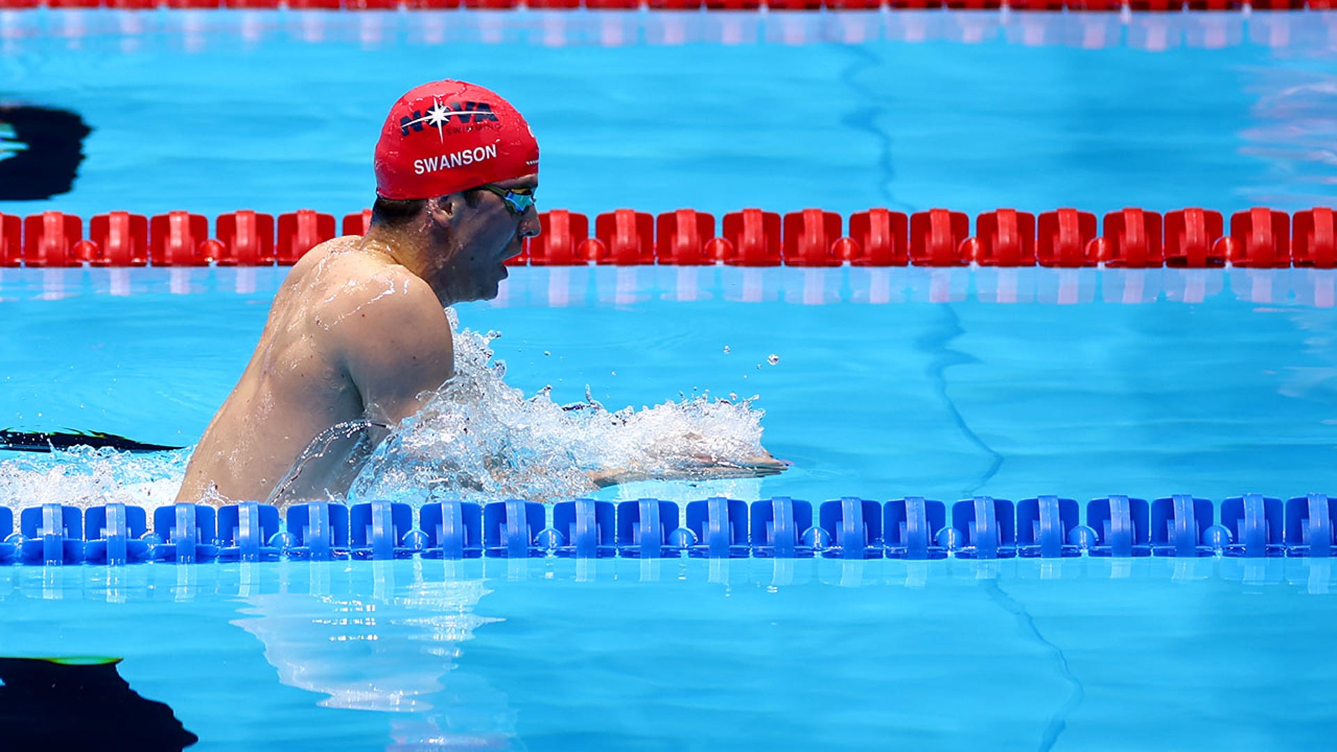 Charlie Swanson swims