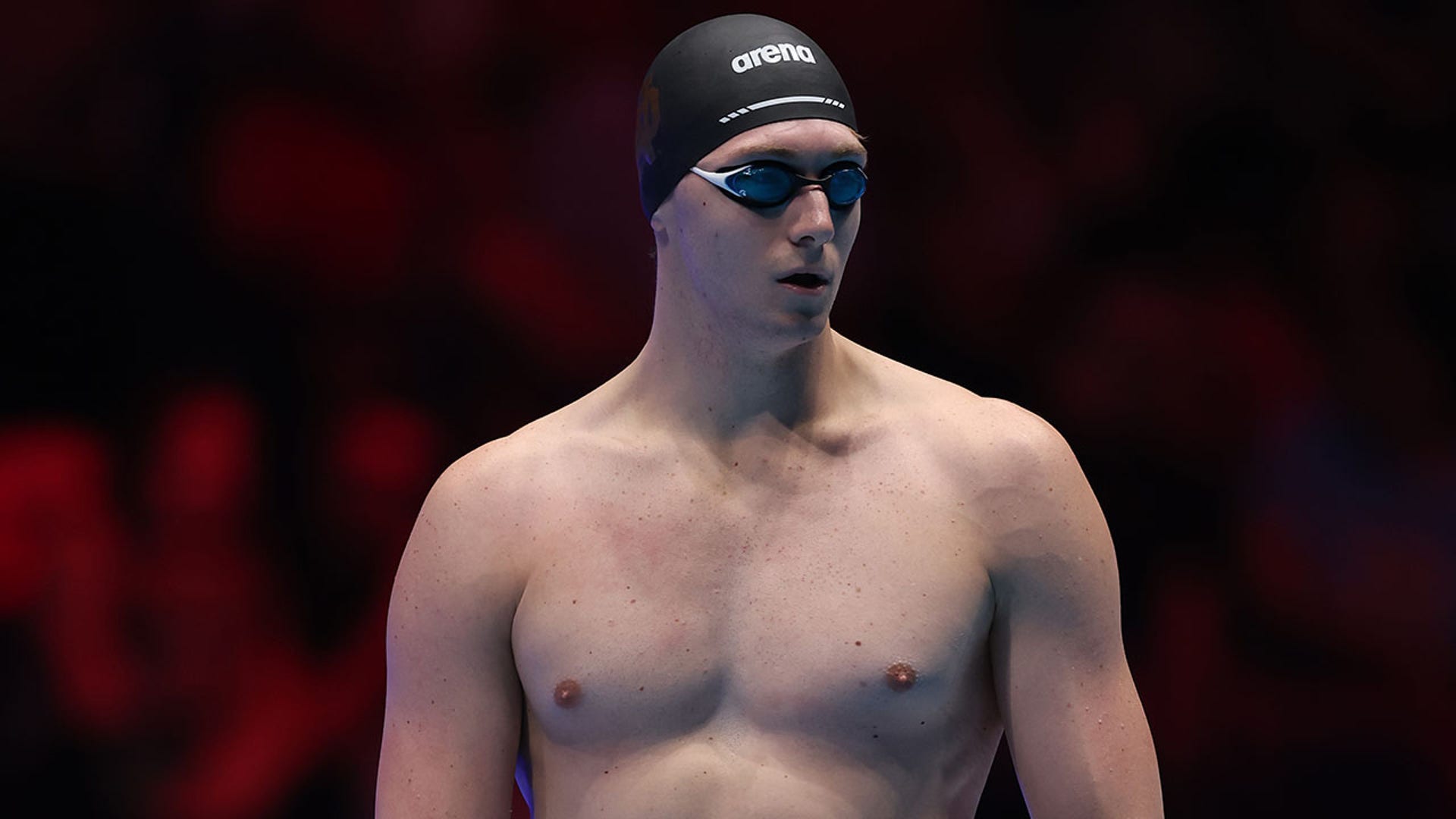 Chris Guiliano looks on