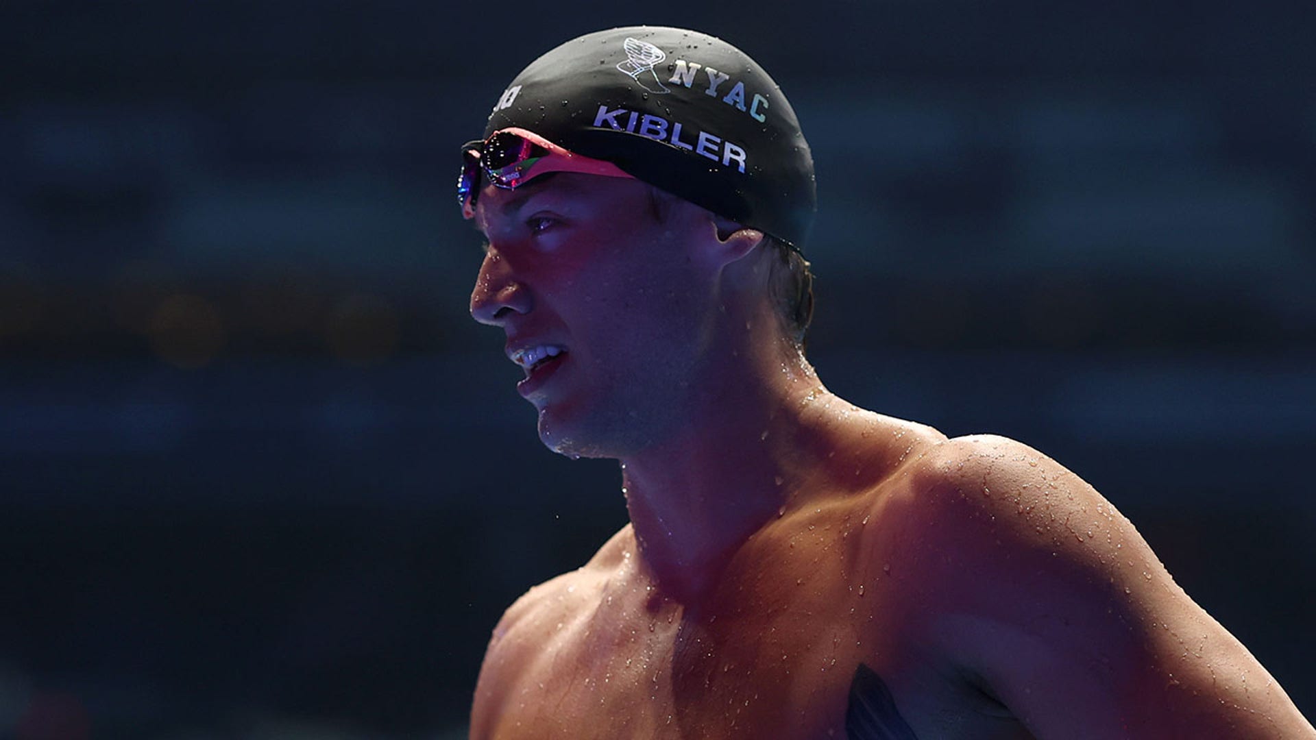 Drew Kilber looks on