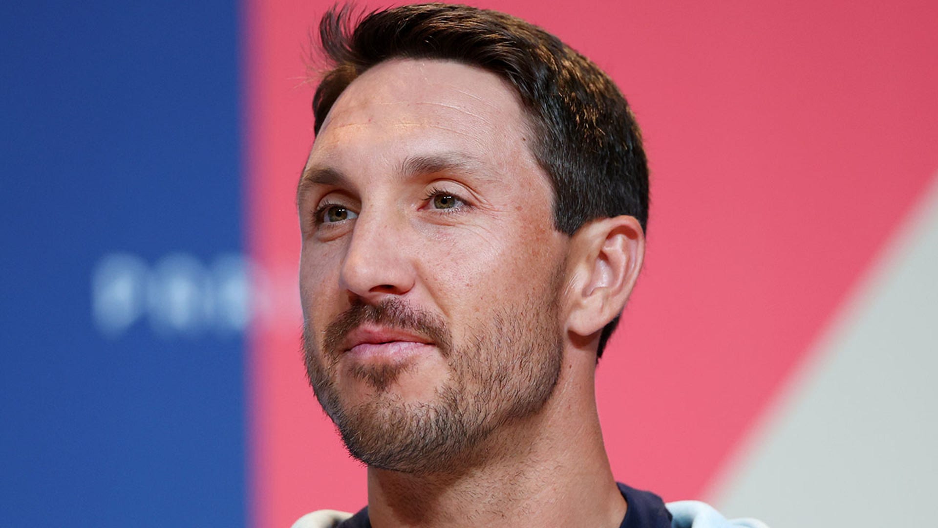 Miles Evans talks to reporters