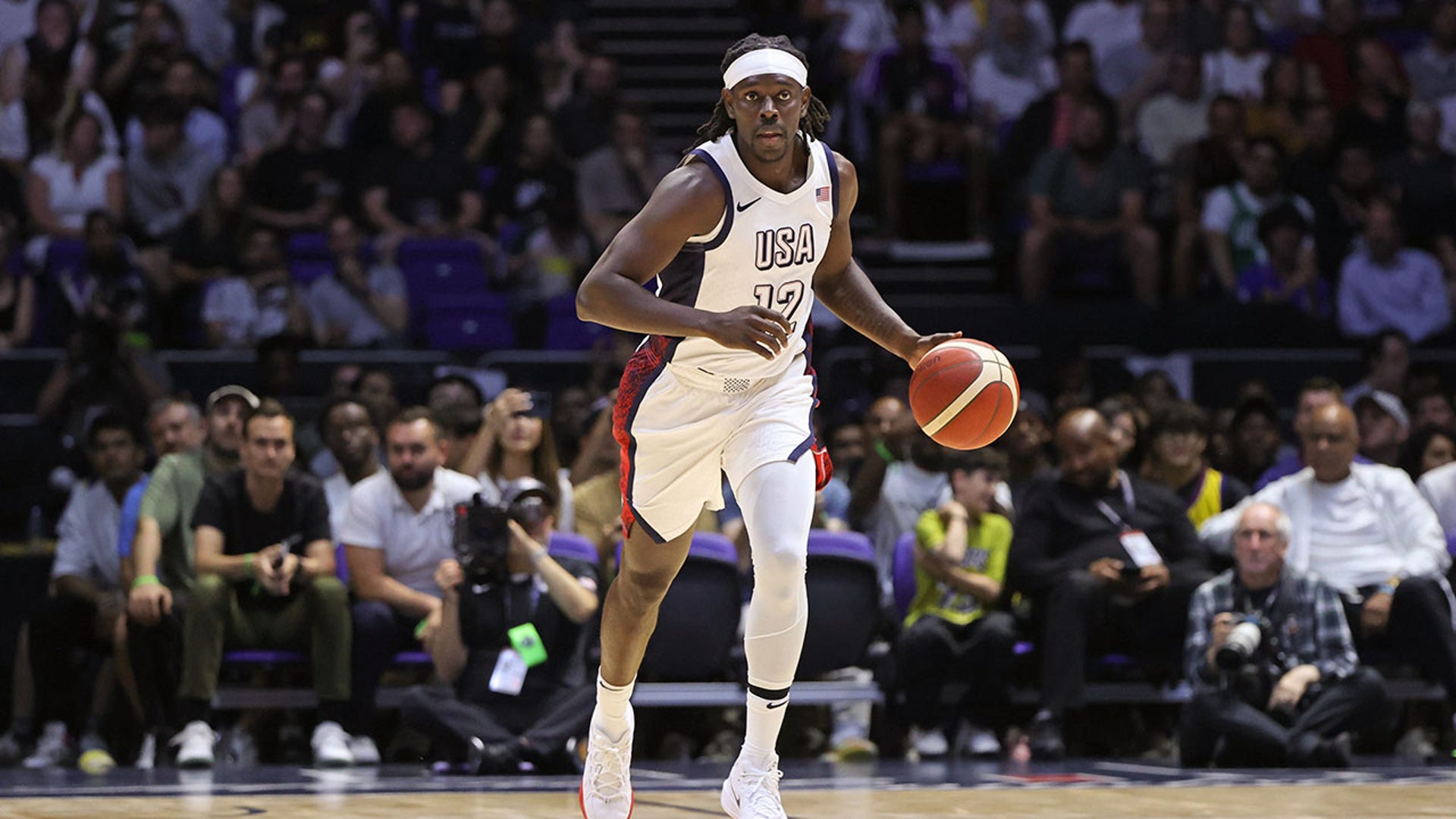 Jrue Holiday dribbles