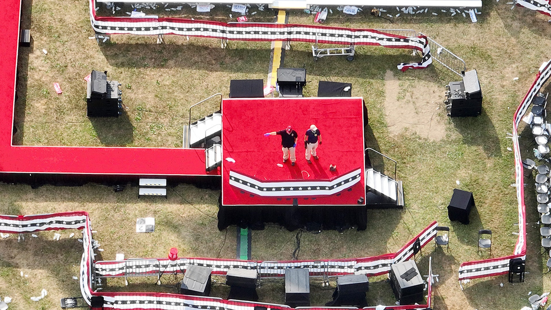 Investigators review the stage Monday morning