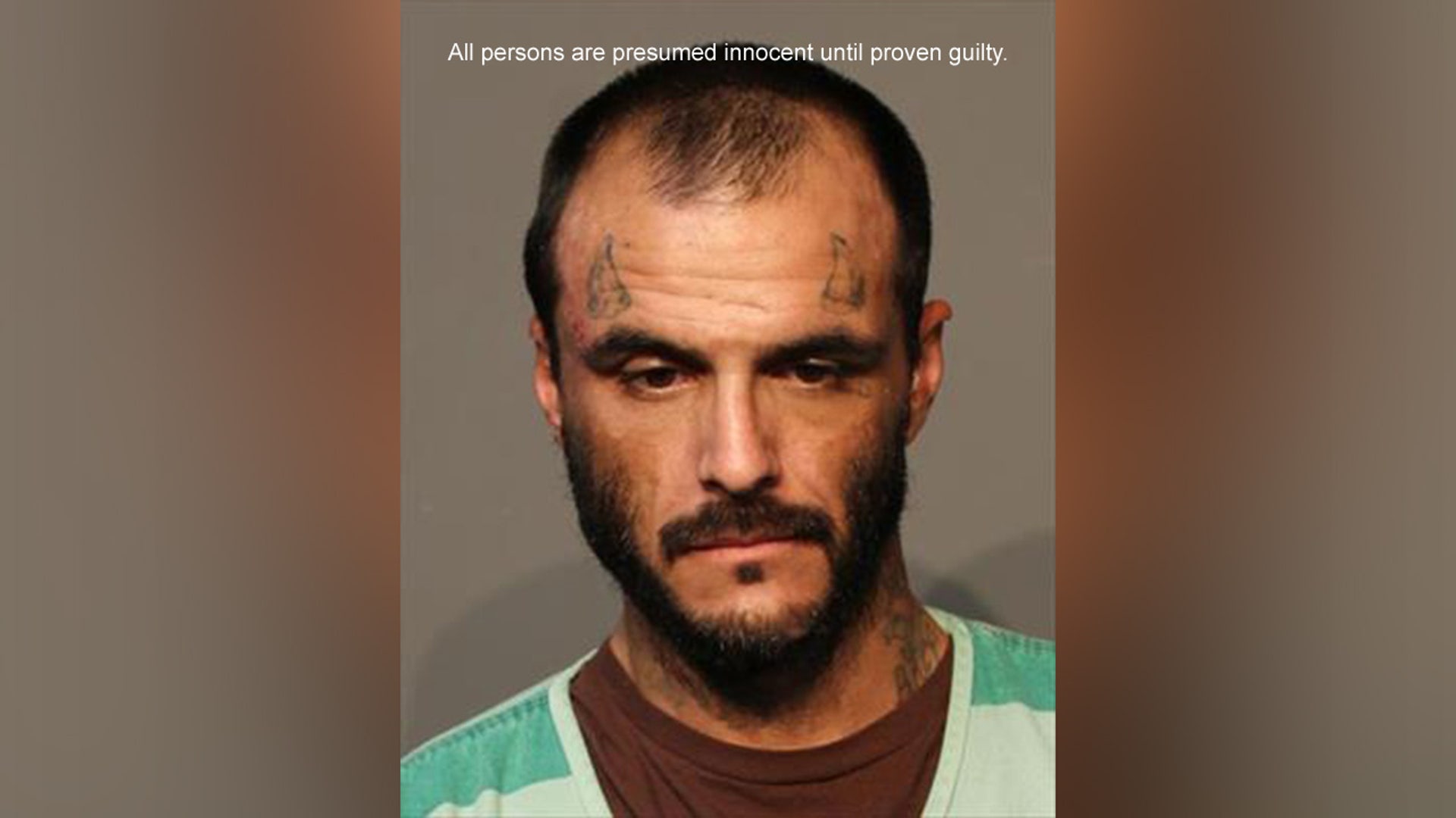 A mugshot of Johnathan Stewart