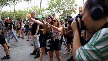 Locals in one Mediterranean hot spot load up water guns to protest mass tourism: 'Go home'