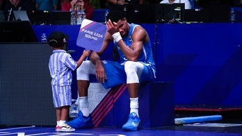 NBA star Giannis Antetokounmpo cries with sons in emotional scene after helping Greece reach Olympics