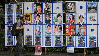 Wacky antics in Tokyo's governor race, from raunchy photos to dog posters, take over the city