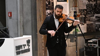 Jewish soldier, wounded in war, memorializes young Holocaust hero by playing his violin