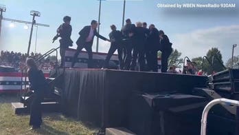 Video shows moment Secret Service agents tossed Trump's shoes offstage