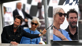 Keanu Reeves and girlfriend Alexandra Grant make rare joint appearance at motorcycle race in Germany