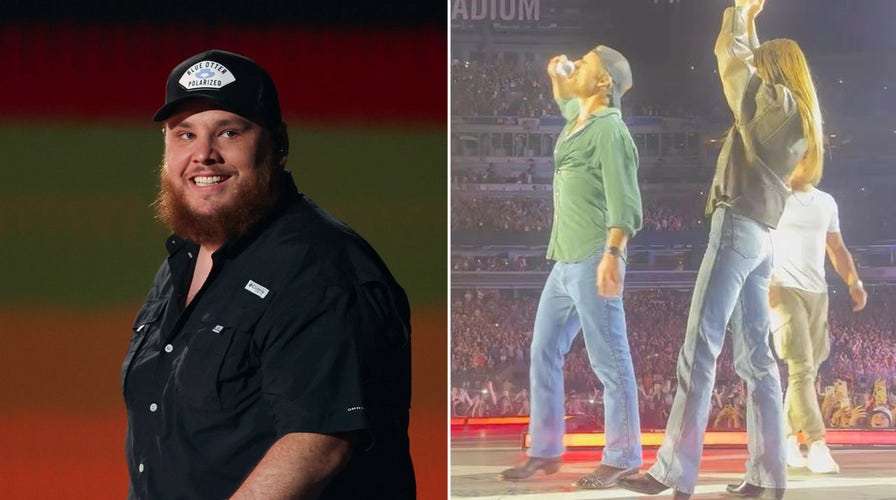 Luke Combs, actor Glen Powell chug a beer during country star's concert