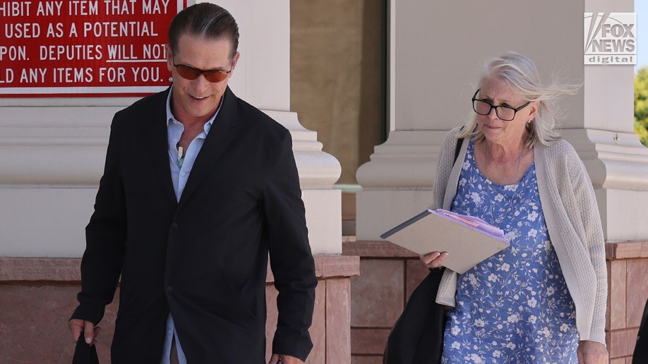 Stephen Baldwin and Elizabeth Keuchler depart the courthouse for a lunch break during the second day of their brother Alec Baldwin’s trial