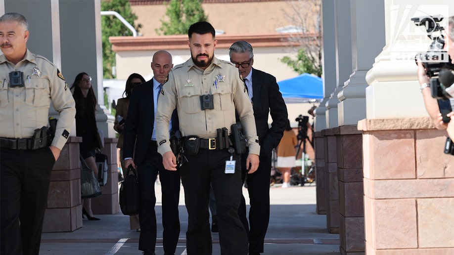 Alec Baldwin and his attorneys, Alex Spiro, and Luke Nikas depart First Judicial District Court in Santa Fe, New Mexico on Tuesday, July 9, 2024. Jury selection for Baldwin's involuntary manslaughter trial began today, nearly three years after the fatal shooting of "Rust" cinematographer Halyna Hutchins.