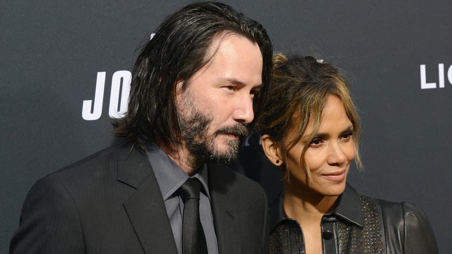 Keanu Reeves and Halle Berry at "John Wick" premiere