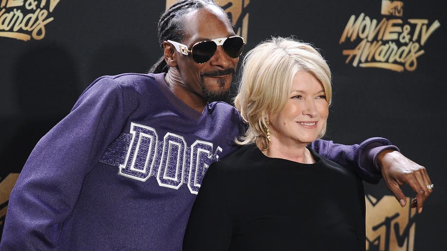 Martha Stewart posing with Snoop Dogg