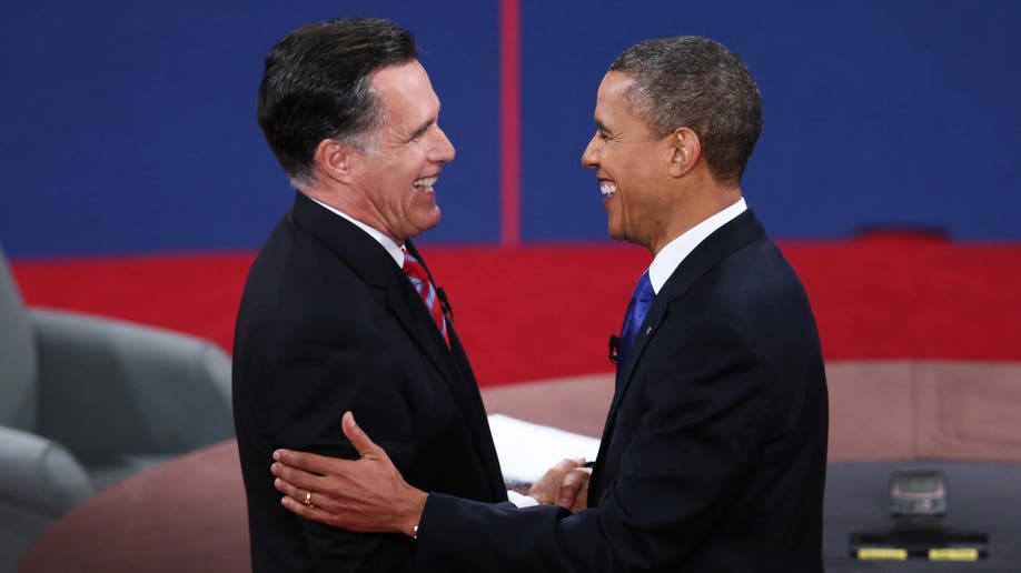 Barack Obama shaking hands with Mitt Romney