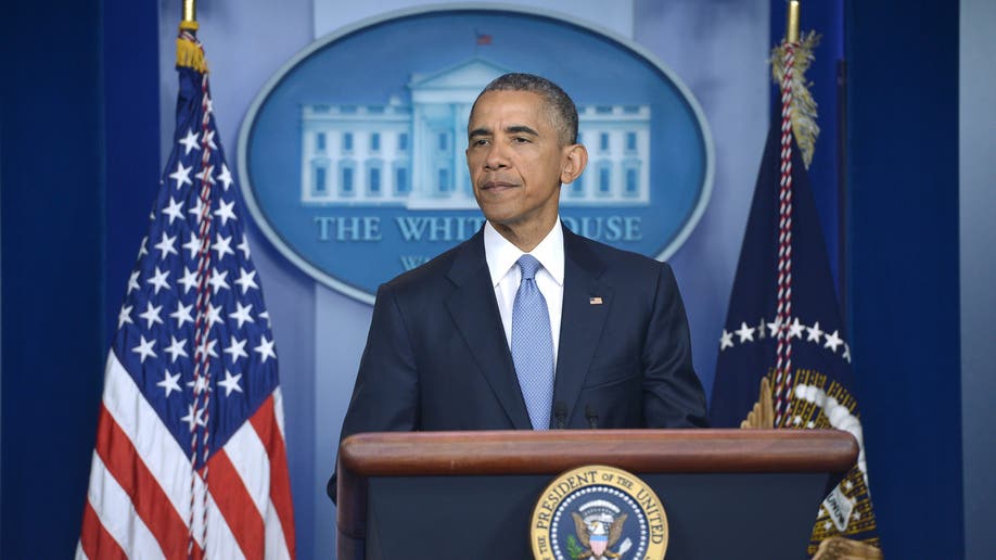 Barack Obama speaking at press briefing