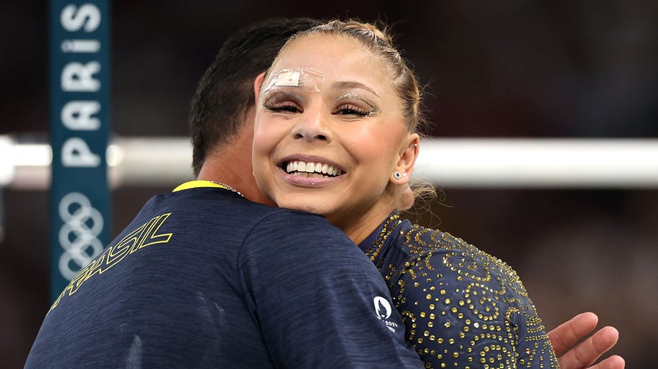 Brazilian gymnast suffers cut above eye after hard fall in warmups at Paris Olympics