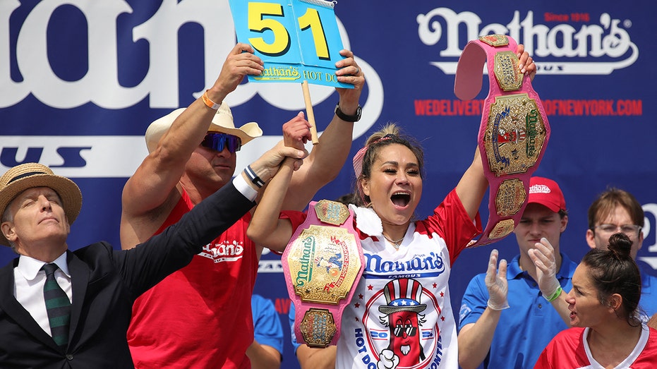 Miki Sudo prevails at annual hot dog eating contest, sets women's record thumbnail
