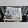 A copy of the New York Post featuring a front page article about the shooting at former US President Donald Trump's campaign event, in the Brooklyn borough of New York