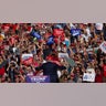 Donald Trump greets the crowd during a campaign event at Butler Farm Show Inc