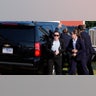 The vehicle carrying Republican presidential candidate former President Donald Trump is surrounded by U.S. Secret Service
