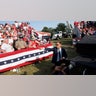 A Secret Service member and the crowd is seen at republican presidential candidate former President Donald Trump's rally