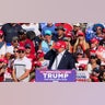 Donald Trump reacts as multiple shots rang out during a campaign rally