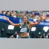Gabby Thomas celebrates
