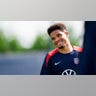 Nathan Harriel smiles