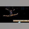 Simone Biles jumps onto the balance beam