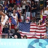 USA fans cheer at men's basketball