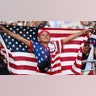 Young USA fan with flag