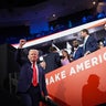 Republican presidential candidate, former U.S. President Donald Trump gestures as U.S. Rep. Byron Donalds (R-FL), Republican vice presidential candidate, U.S. Sen. J.D. Vance (R-OH), Speaker of the House Mike Johnson (R-LA) and his wife Kelly Johnson watch during the first day of the Republican National Convention