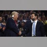 US former President and 2024 Republican presidential candidate Donald Trump shakes hands with US Senator from Ohio and 2024 Republican vice-president candidate JD Vance