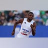 Noah Lyles competes