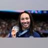 USA's Torri Huske poses with her silver medal after the women's 100m freestyle final at the Paris La Defense Arena on the fifth day of the 2024 Paris Olympic Games in France.?