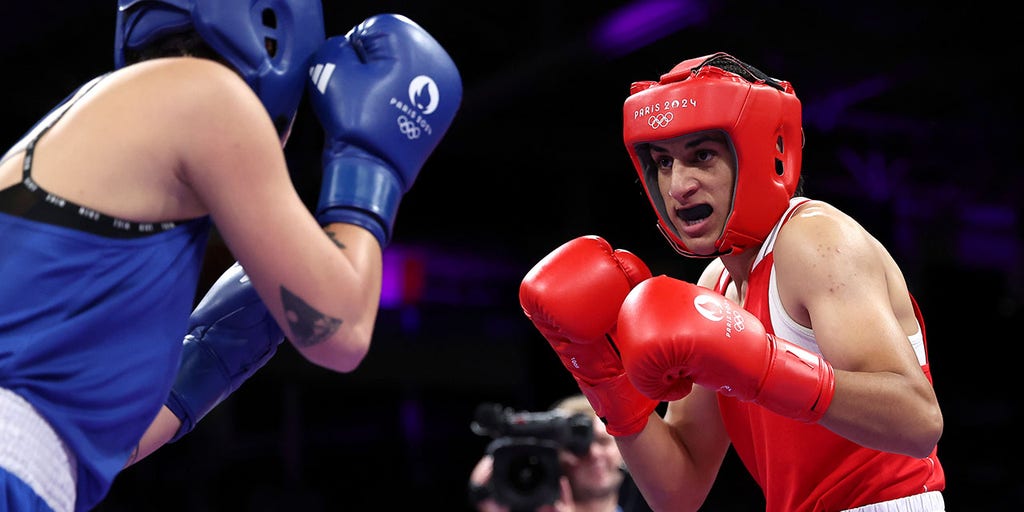Olympic boxer who failed gender test wins quarterfinal bout, guaranteed medal