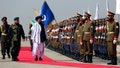 Mullah Abdul Ghani Baradar, the Taliban-appointed deputy prime minister for economic affairs, center, inspects the honor guards during a military parade to mark the third anniversary of the withdrawal of U.S.-led troops from Afghanistan, in Bagram Air Base in the Parwan Province of Afghanistan, Wednesday, Aug. 14, 2024. - Fox News