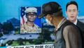 In this photo taken in Seoul on August 16, 2023, a man walks past a television showing a news broadcast featuring a photo of US soldier Travis King (C), who ran across the border into North Korea while part of a tour group visiting the Demilitarized Zone on South Korea's border on July 18. - Fox News