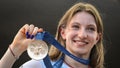 Romanian gymnast Ana Maria Barbosu poses with her Olympic bronze medal she was given on August 16, 2024 in Bucharest, Romania, after a gymnast from the US was stripped of it. Barbosu was awarded the Olympic floor exercise bronze medal originally given to Jordan Chiles, following a decision by the International Olympic Committee (IOC). The IOC decision followed a Court of Arbitration for Sport (CAS) ruling which cancelled the re-evaluation of Chiles' score on the grounds that the appeal of her degree of difficulty was lodged by the US team four seconds after the regulatory deadline, set at one minute. (Photo by Daniel MIHAILESCU / AFP) - Fox News