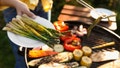 Woman cooking vegetables on barbecue grill outdoors, closeup - Fox News