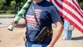 Kenny Wolfam open carries a pistol and wears a "Trump 2020" t-shirt while counter-protesting a "Moms Demand Action" protest in response to a new Texas gun law at Buffalo Bayou Park in Houston, Texas on June 17, 2021. - Governor Greg Abbott signed into law Wednesday a bill that allows Texans to carry firearms in public without a permit, the latest in a series of measures expanding gun rights in conservative US states. The law, which was passed in the Republican-dominated state Senate and House of Representatives last month, will allow anyone 21 years or older who is not barred from possessing a firearm to carry one in public without a permit. (Photo by Mark Felix / AFP) (Photo by MARK FELIX/AFP /AFP via Getty Images) - Fox News