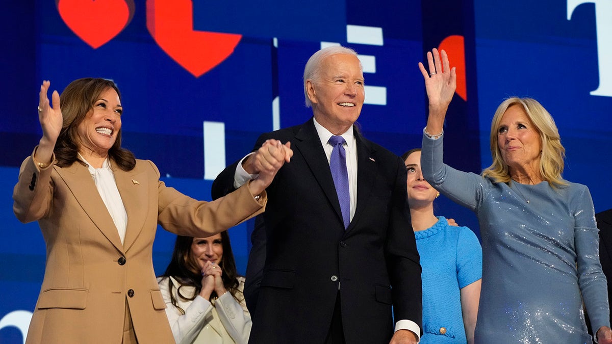 Biden, Jill Biden and Harris on stage at the DNC