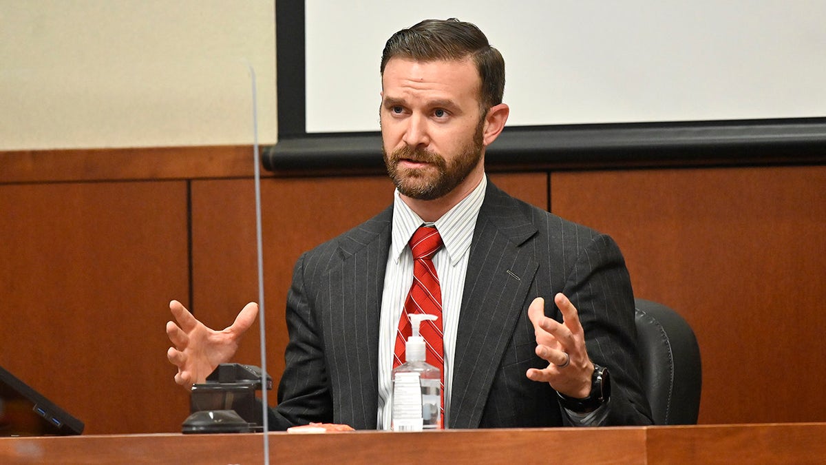 Meany in the witness stand in court