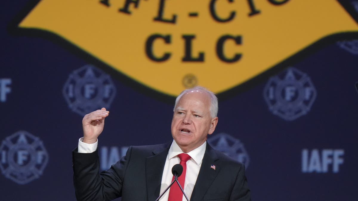 Democratic vice presidential nominee Minnesota Gov. Tim Walz speaks to a union-friendly crowd in Boston, at the International Association of Fire Fighters Convention.