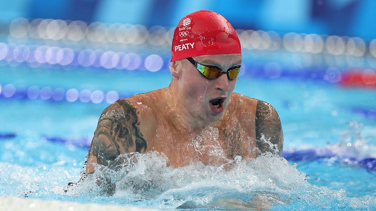 Adam Peaty swims