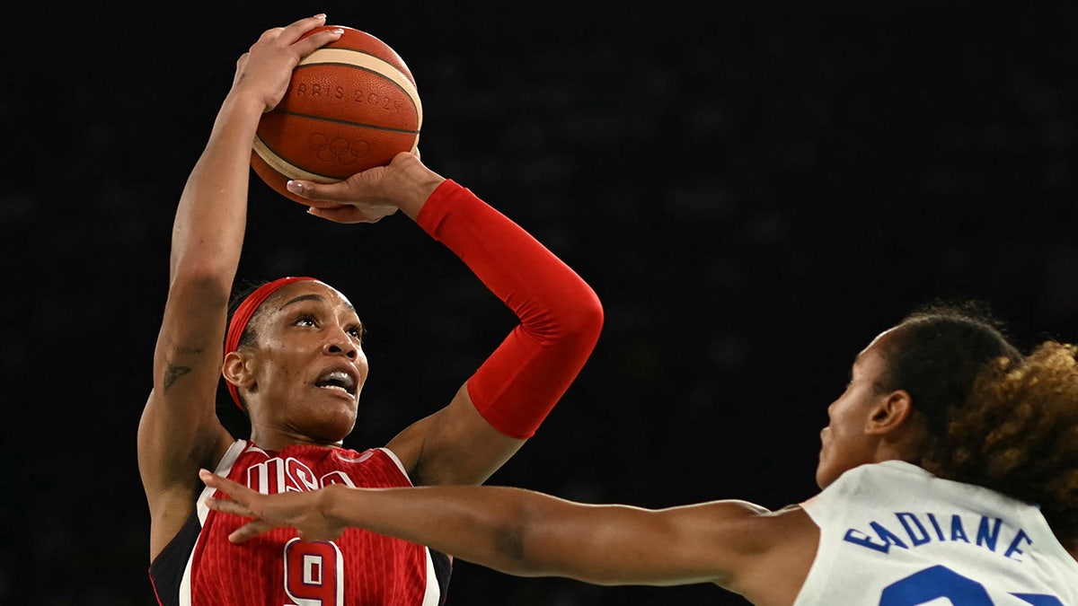 A'ja Wilson takes a shot over France's Marieme Badiane