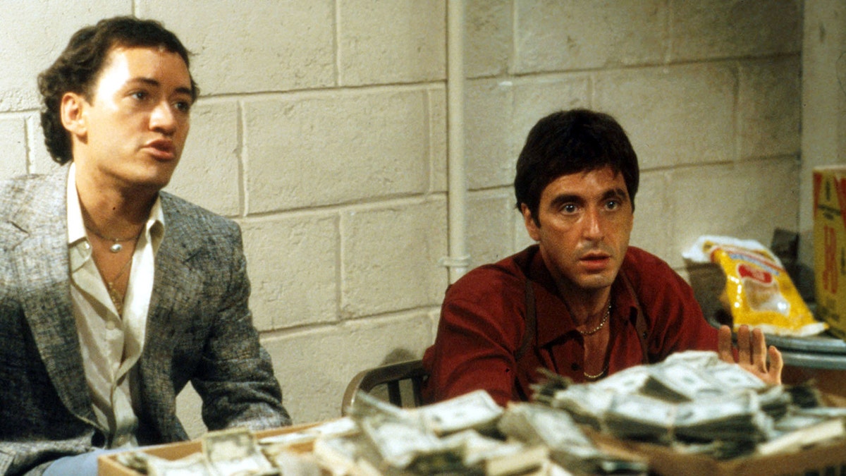 Angel Salazar and Al Pacino in a scene from Scarface